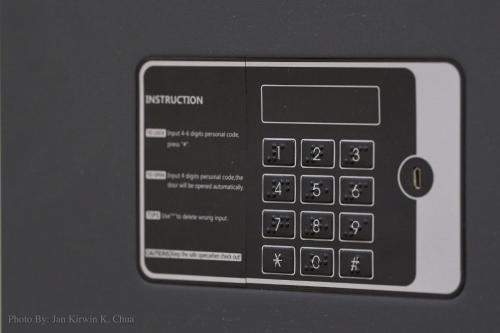 a calculator is sitting on top of a table at Griffin Hotel and Suites in Cebu City