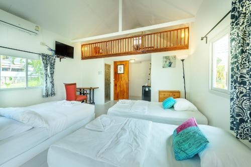 Ένα ή περισσότερα κρεβάτια σε δωμάτιο στο Dhanhill Bed&Cafe