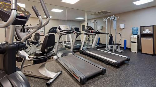a gym with several treadmills and cardio machines at Best Western Plus North Las Vegas Inn & Suites in Las Vegas