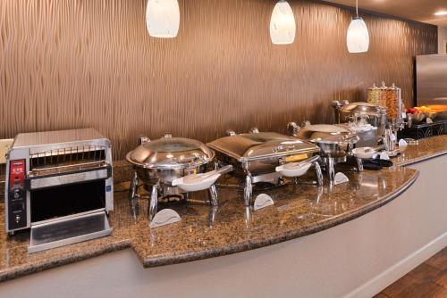 a kitchen filled with lots of kitchen appliances at Best Western Plus Peak Vista Inn & Suites in Colorado Springs