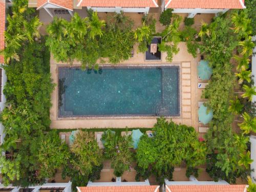 an overhead view of a swimming pool in a resort at Tanei Angkor Resort and Spa in Siem Reap