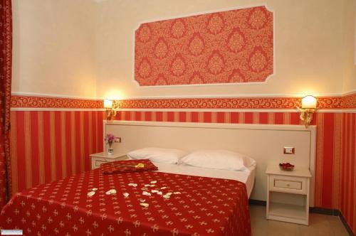 
מיטה או מיטות בחדר ב-Cesar Palace Guesthouse
