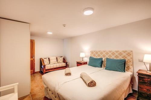 Postel nebo postele na pokoji v ubytování Granada I Apartments