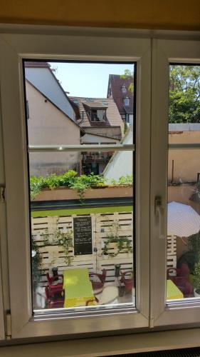 Zahrada ubytování Chambres touristiques La Cour Des Hôtes