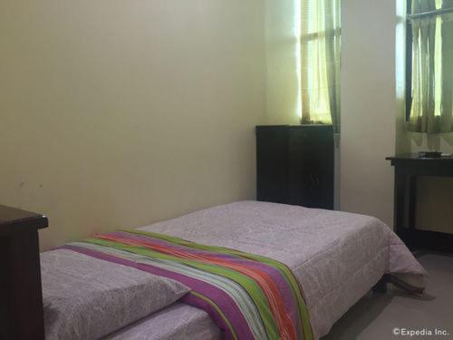 Katil atau katil-katil dalam bilik di Honey Hunt House