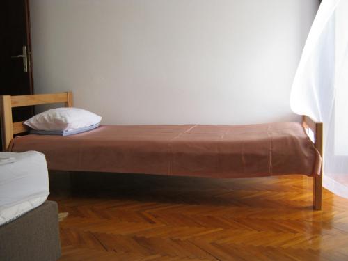 En eller flere senger på et rom på Apartments Nestor