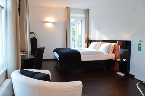 Postel nebo postele na pokoji v ubytování Boutique Hotel La Rinascente