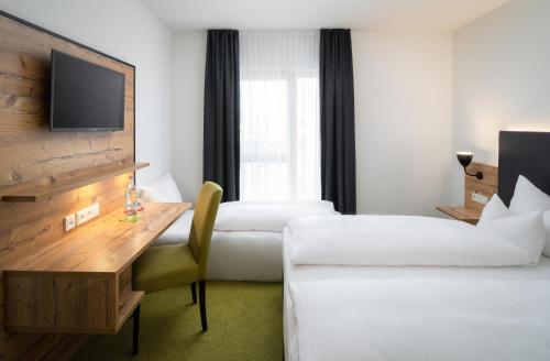 Un ou plusieurs lits dans un hébergement de l'établissement Alb Inn - Hotel & Apartments