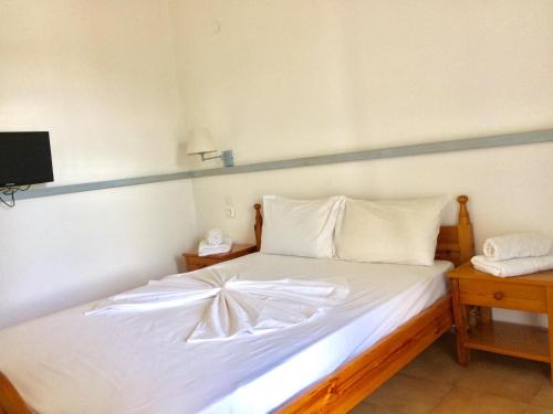 Cama o camas de una habitación en Paradisos Studios