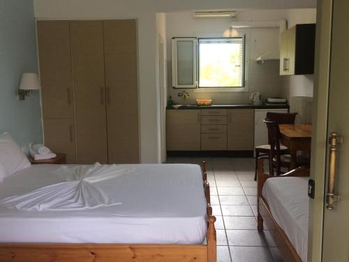 Cama o camas de una habitación en Paradisos Studios