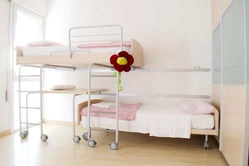 A bed or beds in a room at App4rent Augustus Sea View - Family House - wifi&parking - 3 rooms