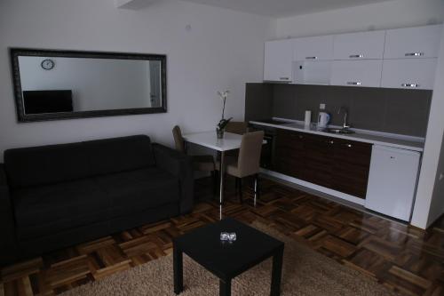 Η κουζίνα ή μικρή κουζίνα στο SAPA Studios & Apartments