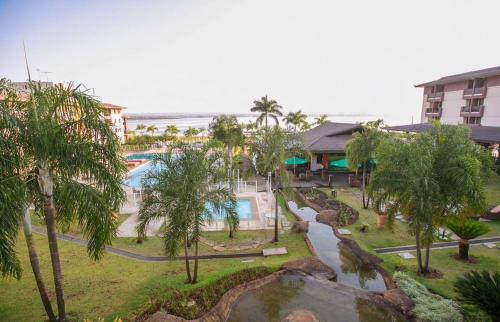 Bazén v ubytování Life Resort - Flat Aconchegante nebo v jeho okolí