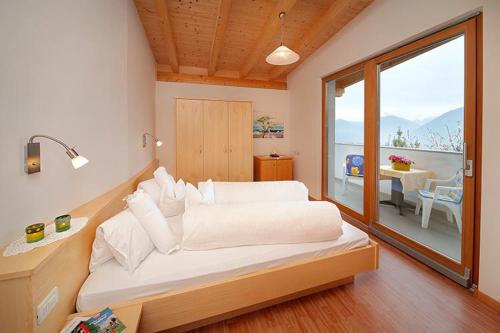 Ένα ή περισσότερα κρεβάτια σε δωμάτιο στο Ferienwohnungen Baumannsog