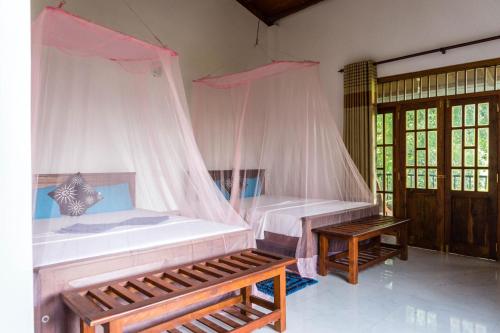 Giường trong phòng chung tại Samadhi Nature Resort