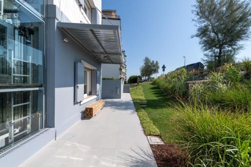 a walkway in front of a building at Sea Tower Torre Telemetrica Lido di Venezia in Venice-Lido