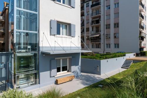 an external view of a building with tall buildings at Sea Tower Torre Telemetrica Lido di Venezia in Venice-Lido