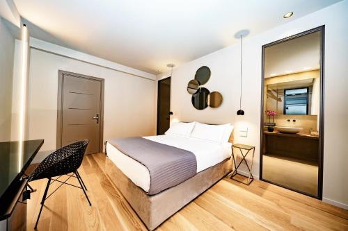 Ένα ή περισσότερα κρεβάτια σε δωμάτιο στο Elite Accommodations & Hydromassage Pool