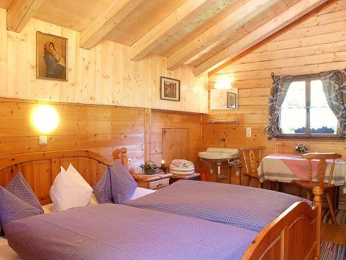 Postel nebo postele na pokoji v ubytování Senninger Alm