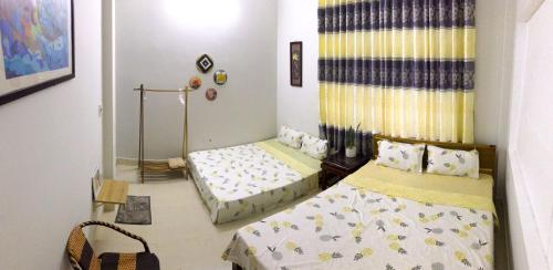 Postel nebo postele na pokoji v ubytování Memory Homestay Hue