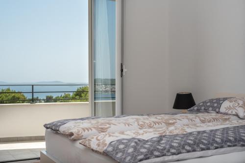 Postel nebo postele na pokoji v ubytování Villa Confido Luxury Apartment 01