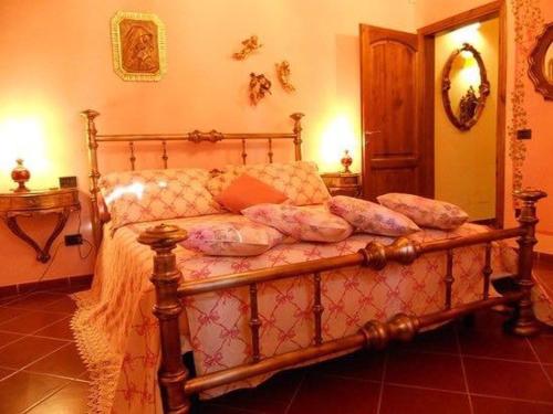 A bed or beds in a room at Rustico la Pioppeta