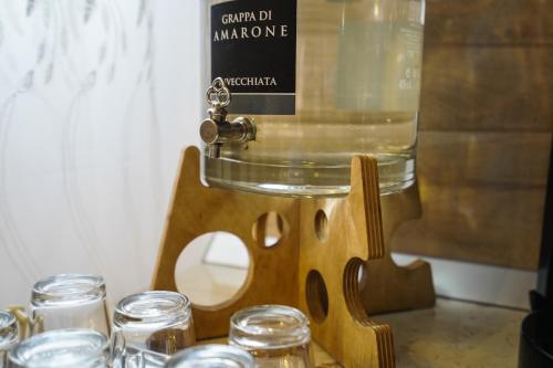 a food processor sitting on top of a table with jars at Pensiunea Trei Lalele in Moisei