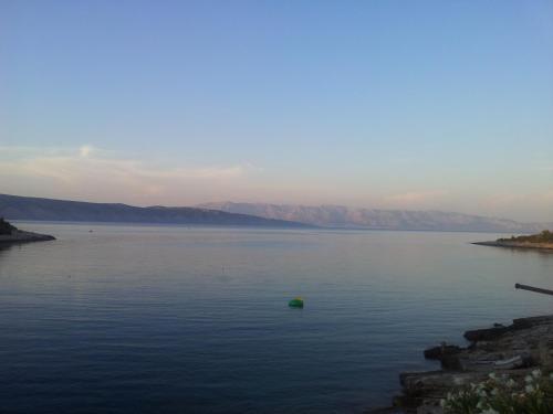 a view of a large body of water at Apartments Habek in Vrboska