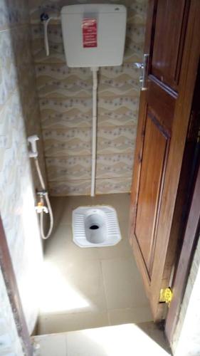 Bilik mandi di Jfour comfort zone hostel