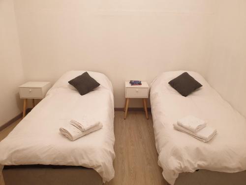 מיטה או מיטות בחדר ב-Le Marche Bed & Breakfast