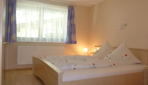 Cama o camas de una habitación en Haus Schennach