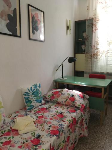 En eller flere senge i et værelse på Agriturismo Pagiano