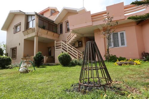 Zahrada ubytování Rainbow Cottages-Budget Friendly rooms