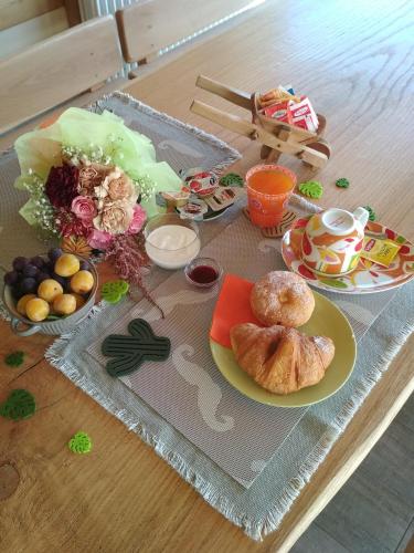 a table topped with plates of food on a table at B&B Monticelli in Gubbio