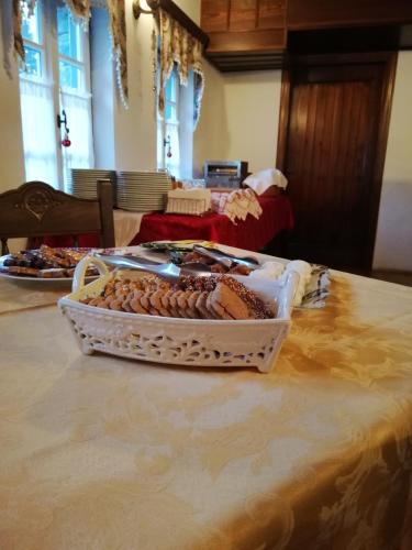 a table with a tray of food on a table at Hotel Petrotechno in Tsepelovo