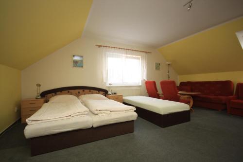 Postel nebo postele na pokoji v ubytování Apartmán pod Černou horou