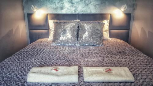 Postel nebo postele na pokoji v ubytování Marine Gardenia Seaside