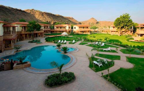 an aerial view of a resort with a swimming pool at Marugarh Resort and Spa in Jodhpur