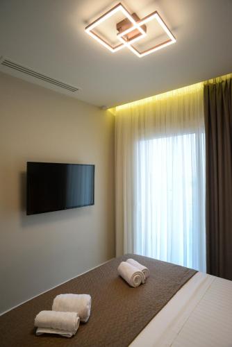 Μια τηλεόραση ή/και κέντρο ψυχαγωγίας στο L - Suites