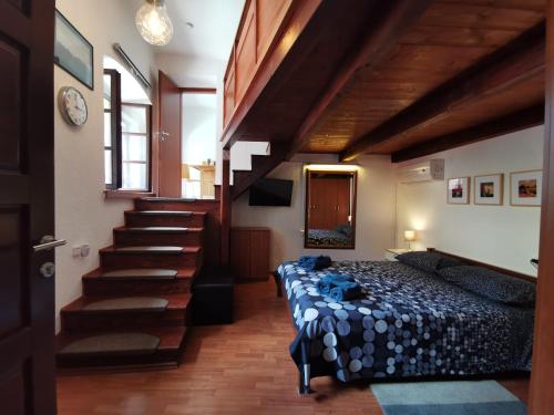 Posteľ alebo postele v izbe v ubytovaní Studio apartman Galerija
