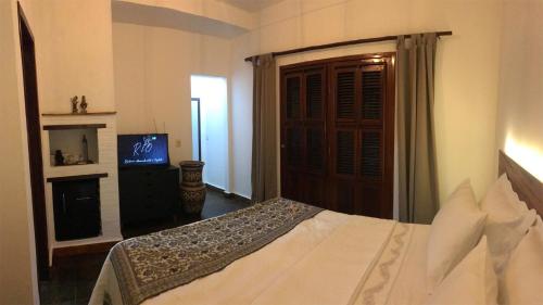 Una cama o camas en una habitación de R.I.O