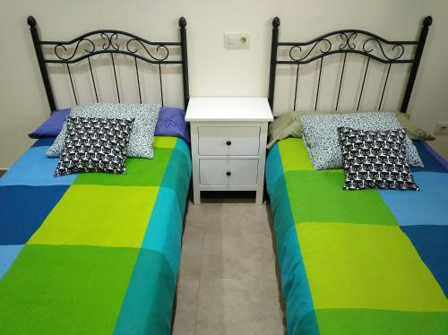 Postel nebo postele na pokoji v ubytování Casa rural El Gato Negro