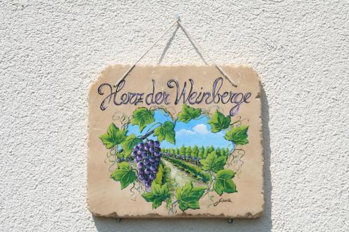 a sign that reads more old medicine hanging on a wall at Herz der Weinberge in Gemmrigheim