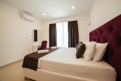 Katil atau katil-katil dalam bilik di Hotel Ambiente Ulcinj