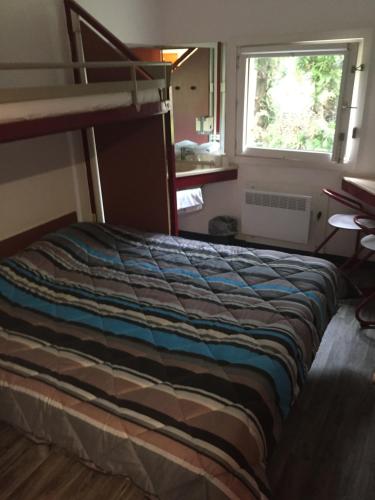 Een bed of bedden in een kamer bij Hotel ClassEco Gent