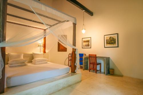Ένα ή περισσότερα κρεβάτια σε δωμάτιο στο Gangananda