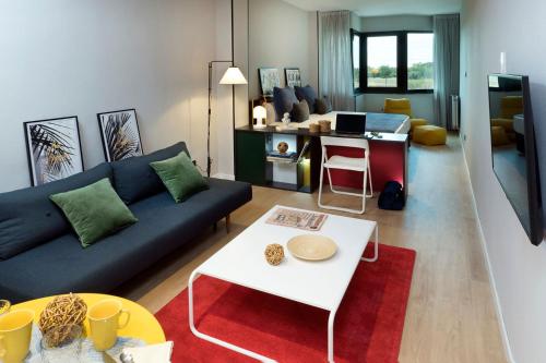 Ruang duduk di The Oliver Apartamentos