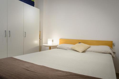Posteľ alebo postele v izbe v ubytovaní Apartamento en la Playa de la Fosca