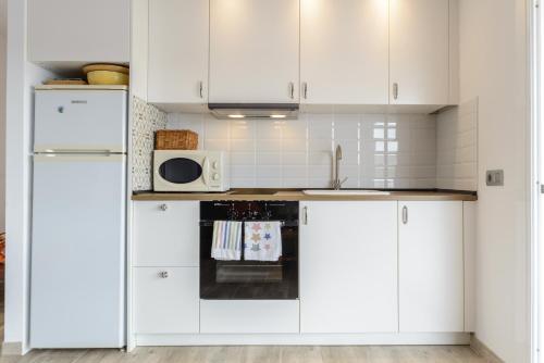 Kuchyňa alebo kuchynka v ubytovaní Apartamento en la Playa de la Fosca