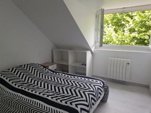 Postel nebo postele na pokoji v ubytování Lourdes Guest House